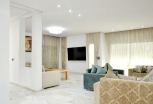 Spacious modern living room with elegant sofas and stylish decor